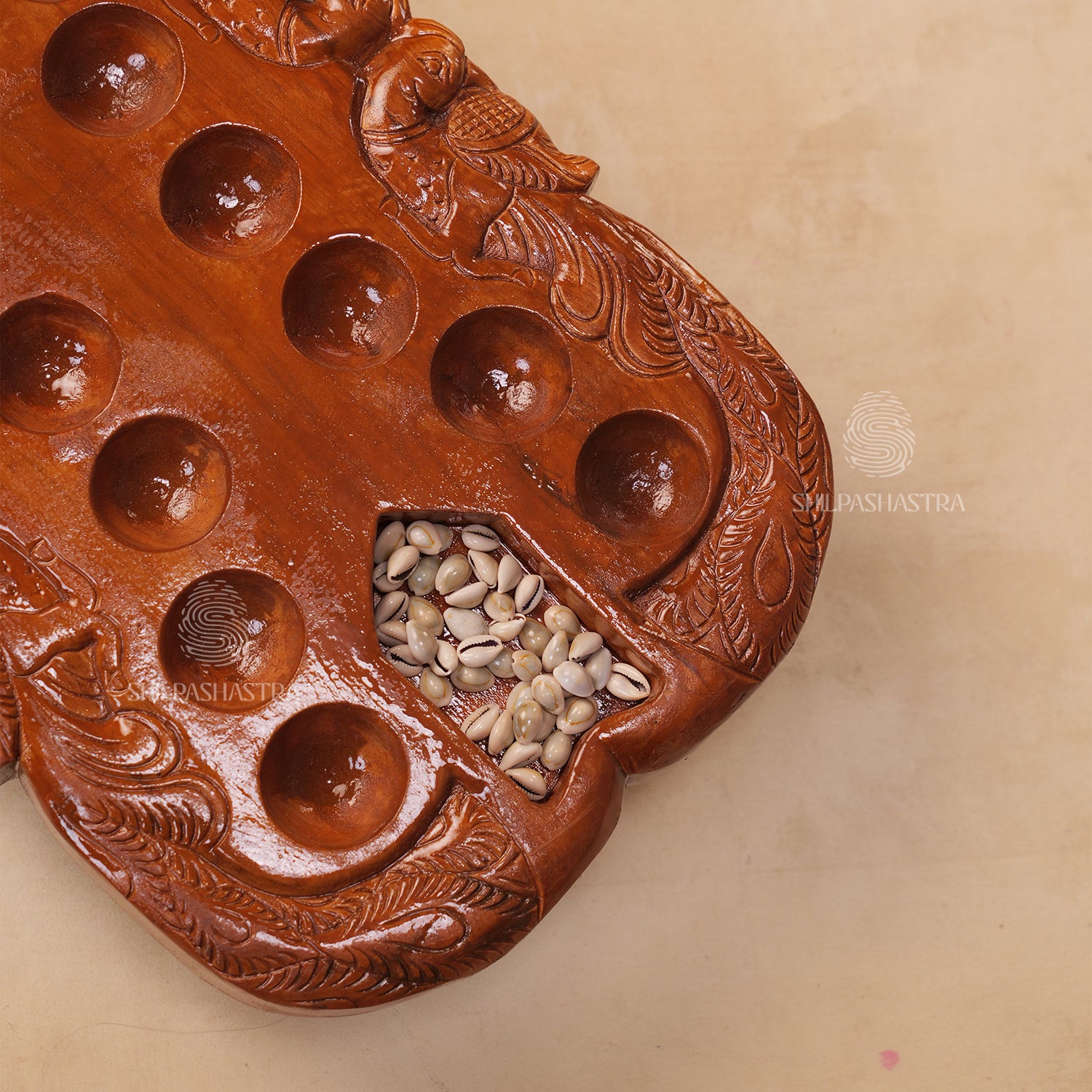 Hand Carved Teakwood Pallanguli Board with Peacock Motif – Traditional Mancala Game