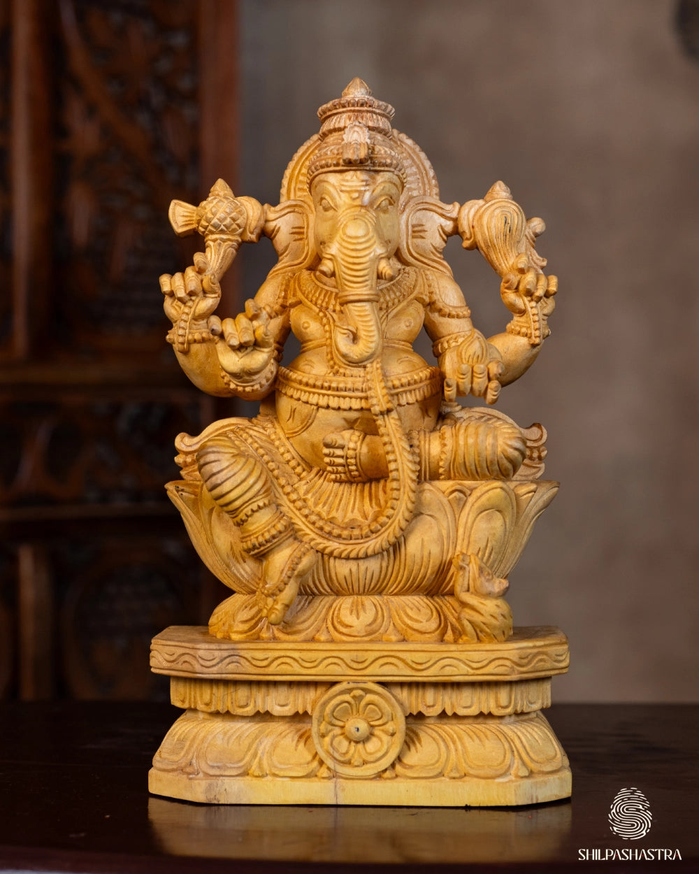 Hand-Carved Wooden Idol of Seated Ganesha on Lotus – Natural Finish