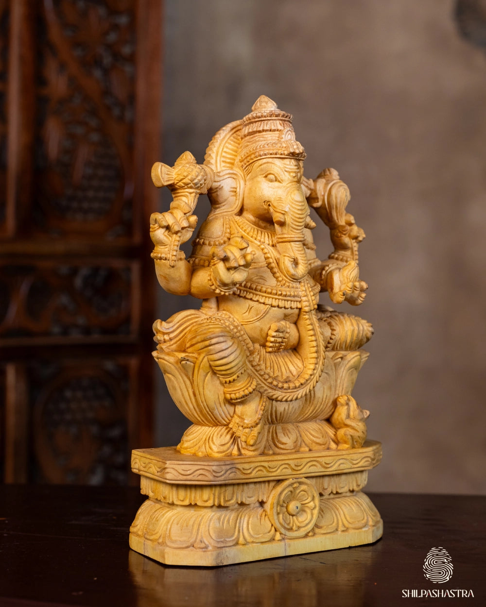Hand-Carved Wooden Idol of Seated Ganesha on Lotus – Natural Finish