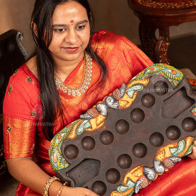 Hand Carved Mahogany Pallanguli Board with Peacock Motif – Traditional Mancala Game