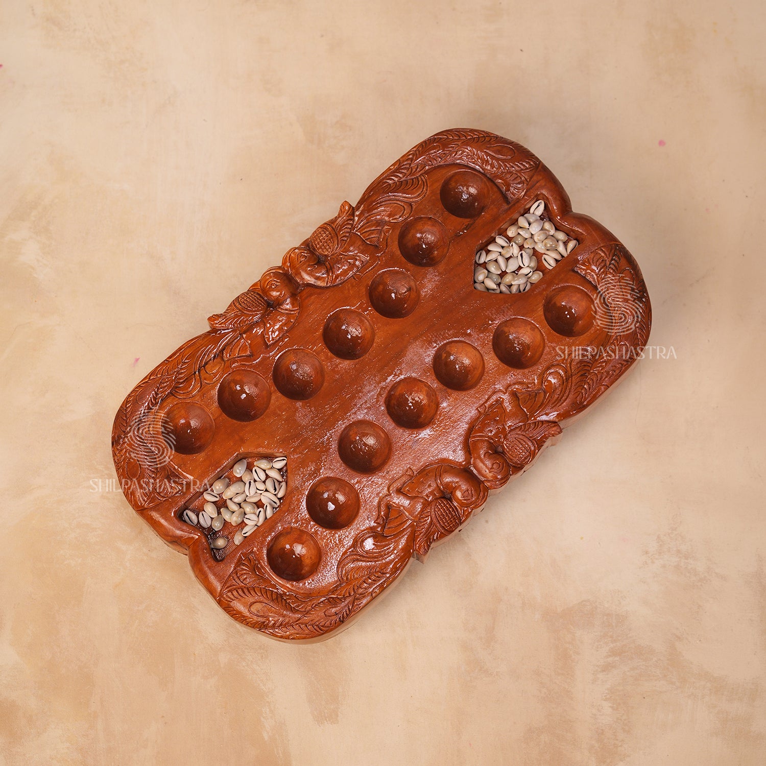 Hand Carved Teakwood Pallanguli Board with Peacock Motif – Traditional Mancala Game