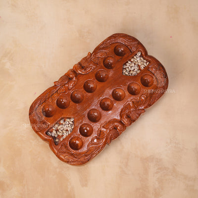 Hand Carved Teakwood Pallanguli Board with Peacock Motif – Traditional Mancala Game
