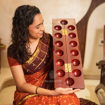 Mahogany Folding Pallanguzhi (14 Pits) with Laser-Engraved Village Folk Art