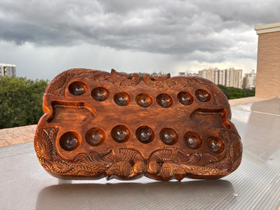 Hand Carved Teakwood Pallanguli Board with Peacock Motif – Traditional Mancala Game